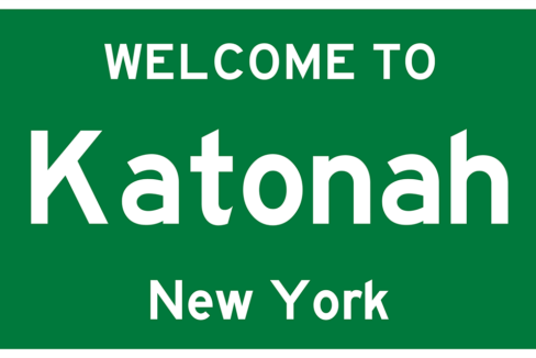 Green welcome sign with bold white lettering for Katonah, New York.