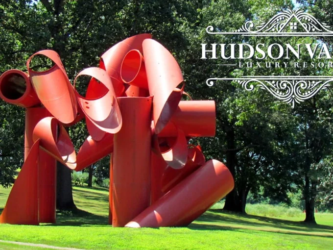 Large-scale outdoor sculpture at Storm King Art Center with Hudson Valley hills in background