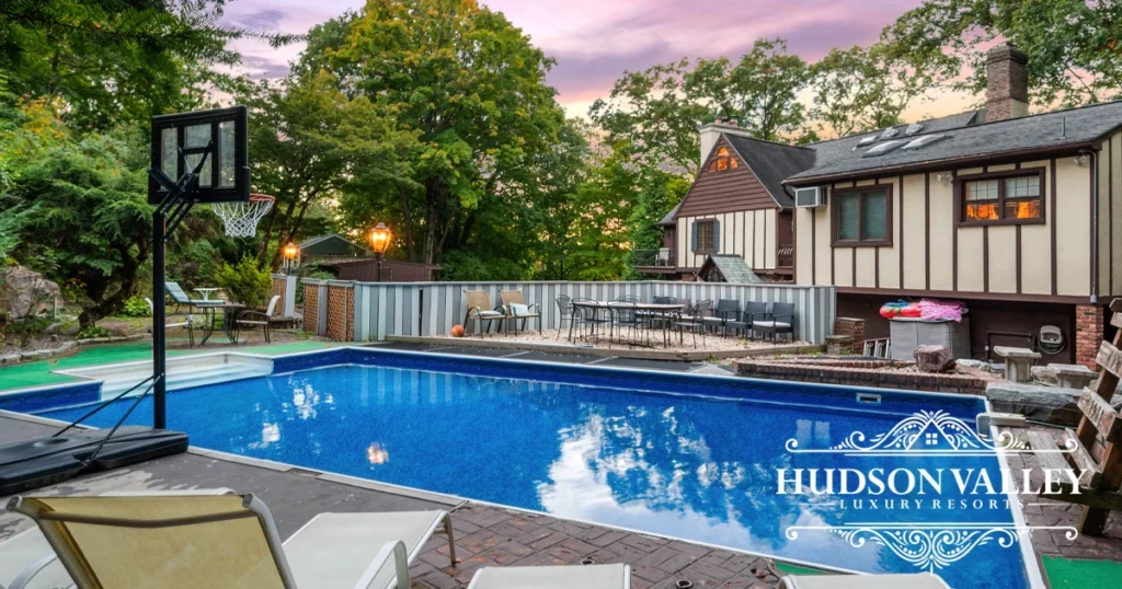 Westchester Castle Tudor Estate exterior with pool and grounds Ossining NY luxury group rental